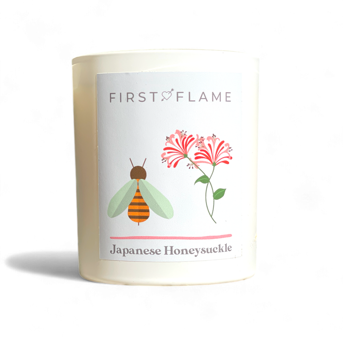 Matte white soy candle labelled Japanese Honeysuckle with bee and flower design
